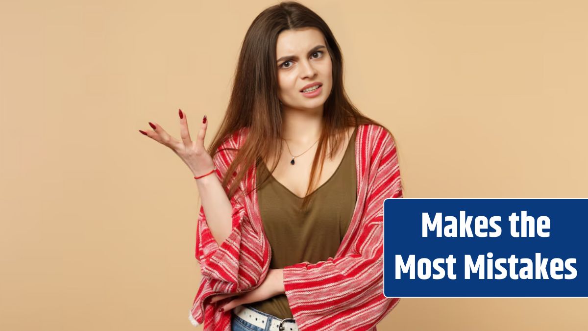 Portrait of irritated young woman in casual clothes looking camera, spreading hand isolated on pastel beige wall background in studio.