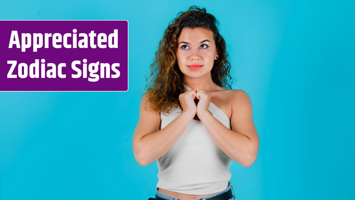 Young girl is looking up by holding hands on chest on blue background.